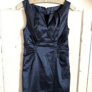 Adriana Papell body hugging iridescent blue dress